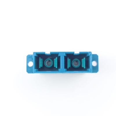 Adaptateur de fibre optique FTTH SC avec matériau PBT à double accouplement anti-poussière pour oreilles UPC